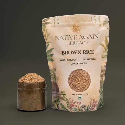 Bag of Native Again Heritage Brown Rice with a small container of rice on a dark background