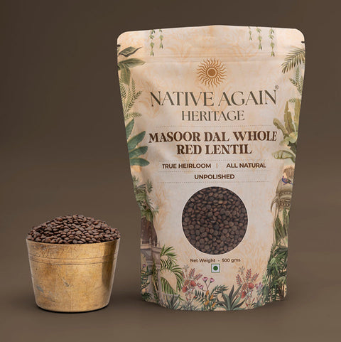 Native Again Heritage Masoor Dal Whole Red Lentil packaging with a container of lentils on a brown background
