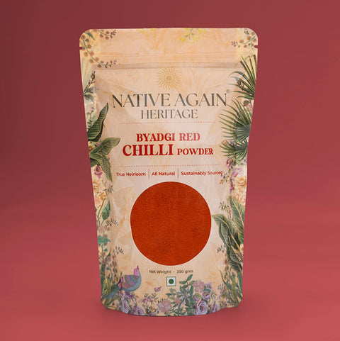 Packaging of Byadgi Red Chilli Powder by Native Again Heritage on a red background